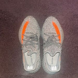 Pair of grey and orange Yeezys size 9 worn twice